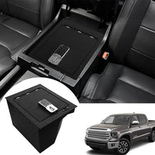 Load image into Gallery viewer, A center console safe with an electronic keyboard lock is installed on the center console of the 2014-2021 Toyota Tundra car.